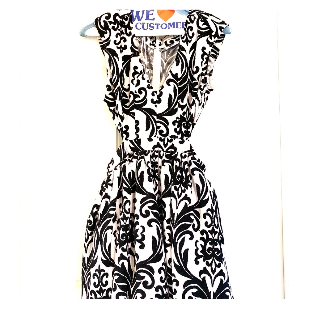 Black and white party dress w/ cutouts on sides